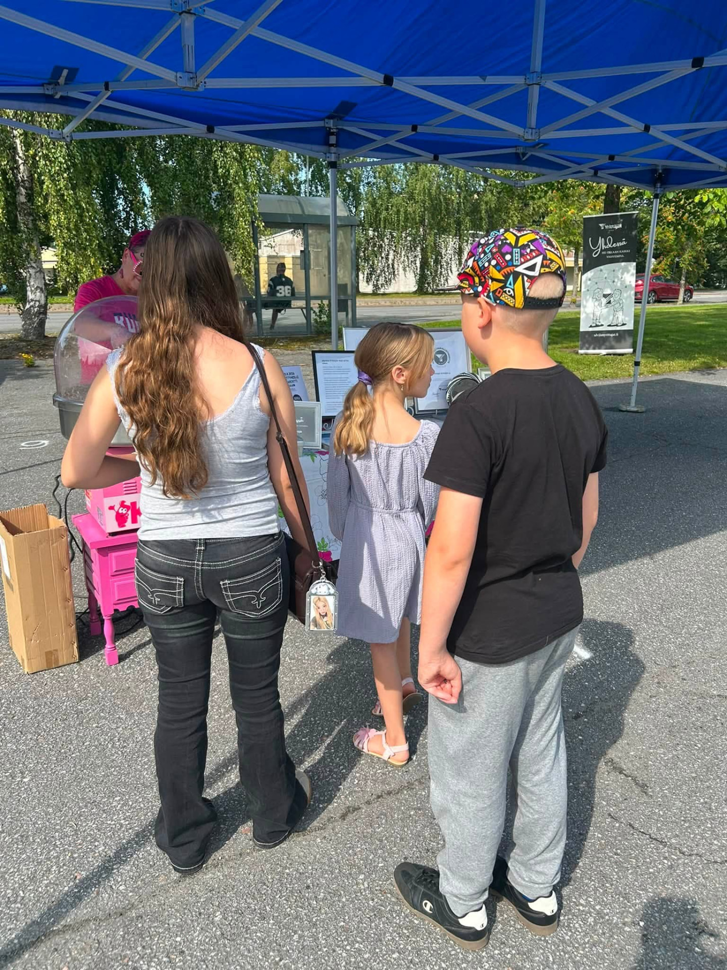 Young people visiting the association's stand at a local community event in Ulvila